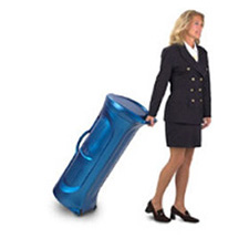 Woman wheeling a graphic shipping case for a trade show display